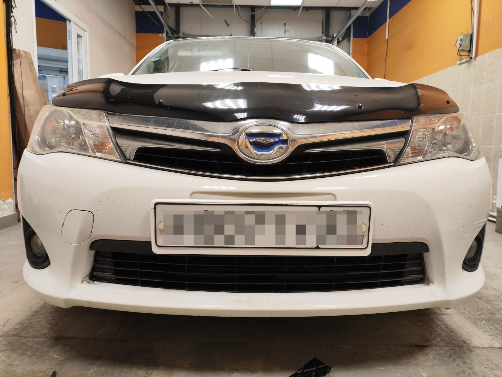 Утеплитель радиатора кожаный Toyota Corolla Fielder (E160) 2012 - 2015