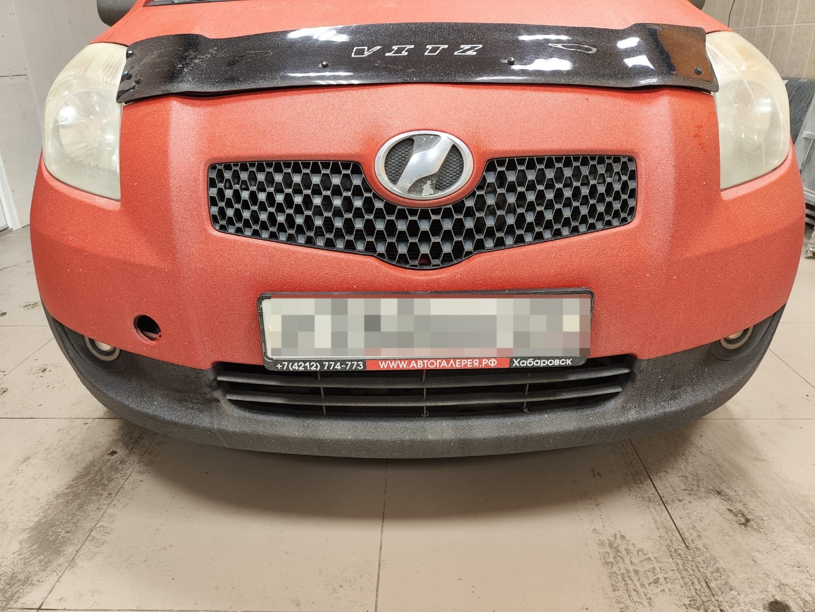 Утеплитель радиатора кожаный Toyota Vitz 90 2005 - 2007 ДО рестайлинг